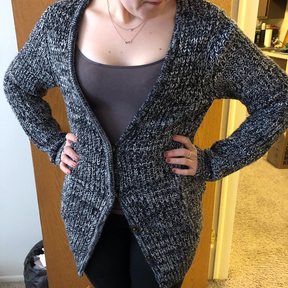Thick woven black and white cardigan.